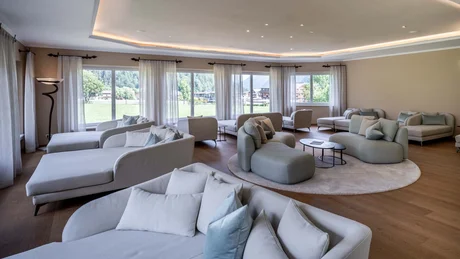 Wiesenhof from all perspectives Bright modern lounge area with comfortable sofas and abundant natural light